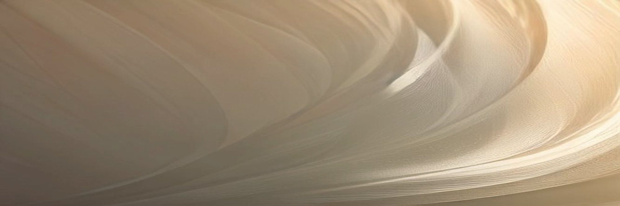 Ivory silk mikado folded in soft sculptural waves under raking window light